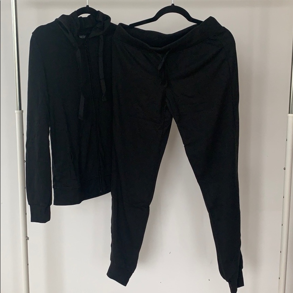 A set of sweatpants and a sweater.